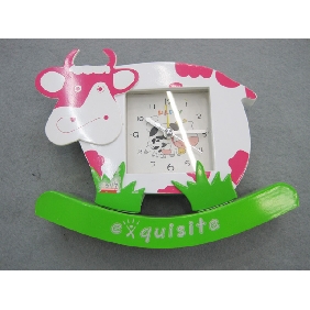 Wholesale 2010 Promotional newly decorative cow shape vivid color high quality plastic electronic mini alarm clock