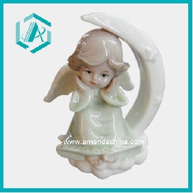 Wholesale Religious Gift of Cute Pottery Little Angel on the Moon Statue