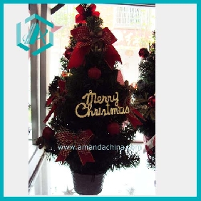 Wholesale New green economical artificial Christmas tree with red bowknot decoration