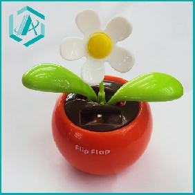 white artificial solar flip flap flower