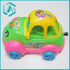 Wholesale 2010 cartoon plastic wind-up toy car to kids for fun