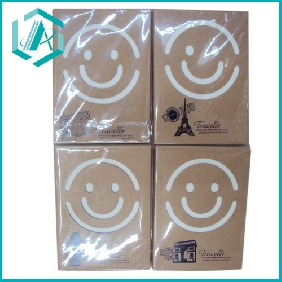 kraftpaper office and school notebook with smiling faces