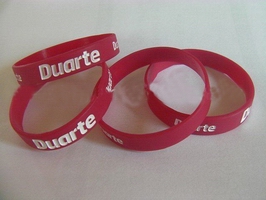 Wholesale red sport style popular low price debossed silicone wristband
