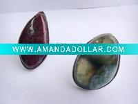 Adjustable gemstone rings