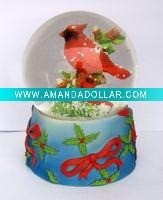 red bird snow globe