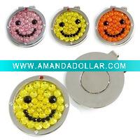 Die struck golf divot tool with smiling face