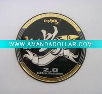 emblem with epoxy