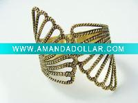 gold metal angel wing bangle