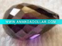 pear shaped purplish red cabochon jewelry