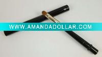 black retractable lip brush