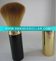 golden and black retractable brush