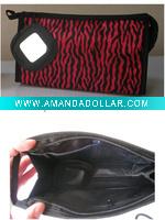 red cosmetic bag with black waves