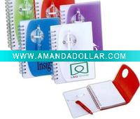 spiral notebook with pen