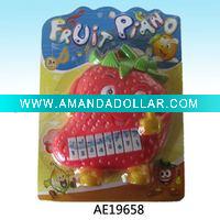 Plastic strawberry music piano keyboard