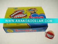 Wholesale wind up jumping teeth 12pcs