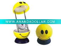 Face table reading lamp with alarm clock