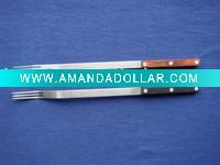 color wooden handle meat fork