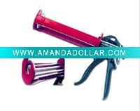 With scissors half casing caulking gun