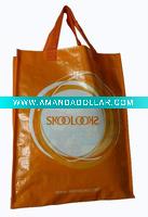 Filmed nonwoven handle bag