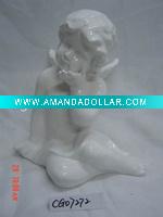 white ceramic angel figurine