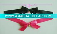 Ribbon bow with small bell