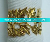 gold napkin ring with leaf design