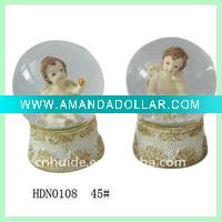 Snow globe with resin angel inside