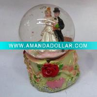 Wholesale Glass water globe with polyresin base