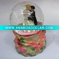 glass water globe with polyresin base