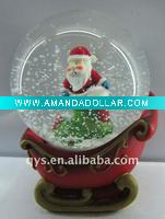 santa snow globe on sled