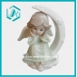 Wholesale Religious Gift of Cute Pottery Little Angel on the Moon Statue