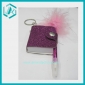 Wholesale A Small Unique Design Notebook With A Feather Pen And A Button