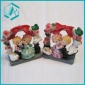 Wholesale resin gift 12*10cm bride and groom arming together around under a rose tree with dovers and a big red butterfly tie