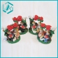 Wholesale resin gifts a boy holding "LOVE"-printed heart besides a girl playing instruments under a rose tree with a white swan