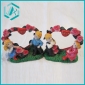 Wholesale 10*9cm resin crafts a boy and a girl sitting on a heart-shaped rose tree