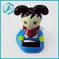 cute black hair girl wearing red coat with pedestal solar wiggler