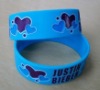 Wholesale 2011 one inch wide silicone wristband with debossed logo