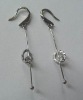 woman dancing dangling earring