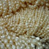 Wholesale 7-8mm white baroque cultured pearl strand