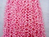 Wholesale 5-6mm freshwater dyed pink rice oval pearl strands