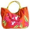 flower printed orange handbag