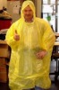 Wholesale yellow pe raincoats with beautiful style