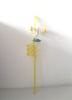 7-up plastic straw with figurine
