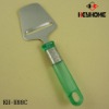 cheese planer with green handle
