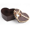 Heart shaped paper gift box with ribbon and dots