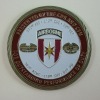 Die struck enamel coin