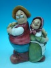 Ceramic farmer couple decoration