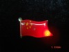 Flashing flag pin