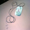 etched dog tag upon customer artwork