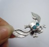 Wholesale Metal skull heads with tercel's wing finger ring inset blue crystal Sales hot Fashion jewelry products